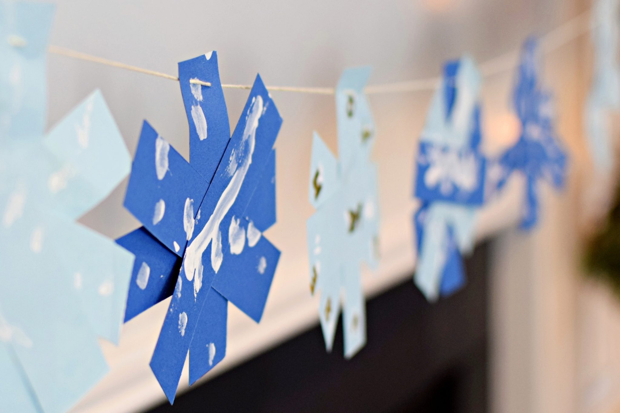 Easy Painted Snowflake Garland Craft 2024 - Entertain Your Toddler