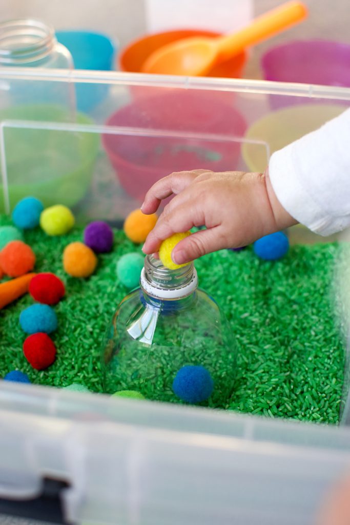 Pom Pom Eggs in the Grass Sensory Bin 2020 Entertain Your Toddler