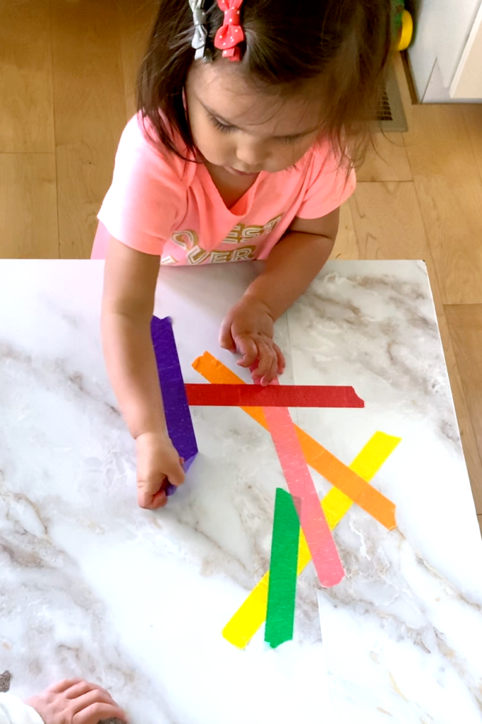 Sticky Tape Art for Fine Motor Skills 2022 Entertain Your Toddler
